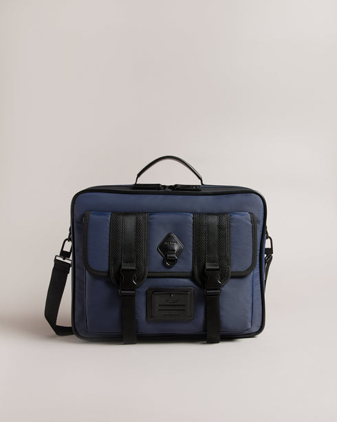 TRAVYL-Bags-It's All In The Details:the Fabric Of This Product Is Made Of 100% Recycled Polyester. Using Recycled Polyester Helps Divert Plastic Waste From Ending In Landfills And Helps Us To Reduce Our Dependence On Virgin Materials. Nylon document bag Top handle Buckle fastening Adjustable shoulder strap Name tag Zip fastening Dimensions: 8cm x 30cm x 39cm- Ted Baker Romania
